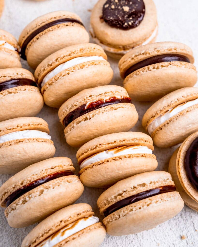 Columns of s'mores macarons laying on their sides