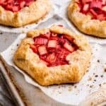 Close up of a mini strawberry rhubarb galette.