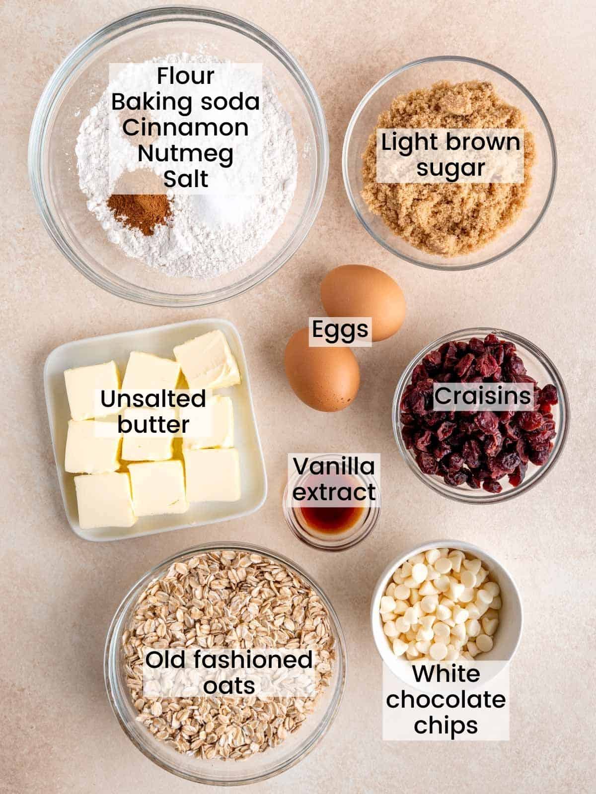 Ingredients needed to make oatmeal craisin white chocolate chip cookies.