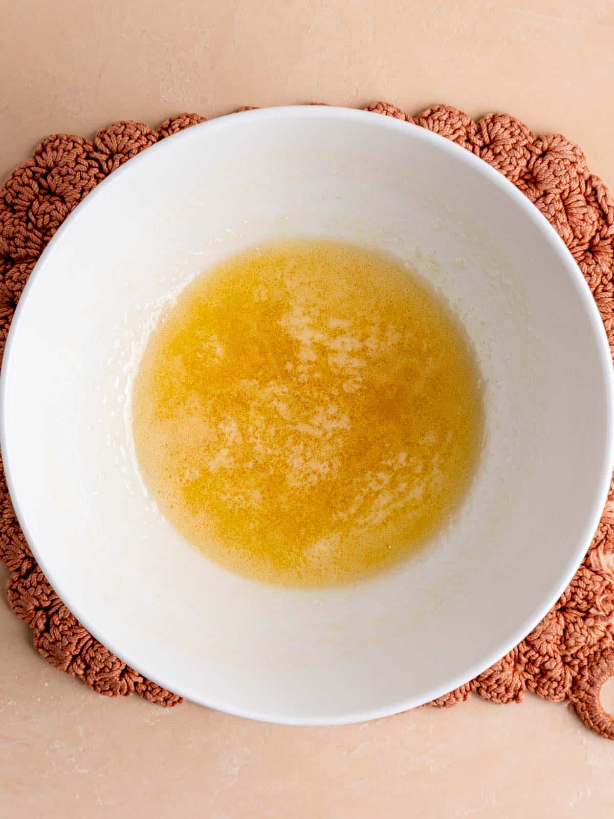 Butter and honey melted together in a bowl.