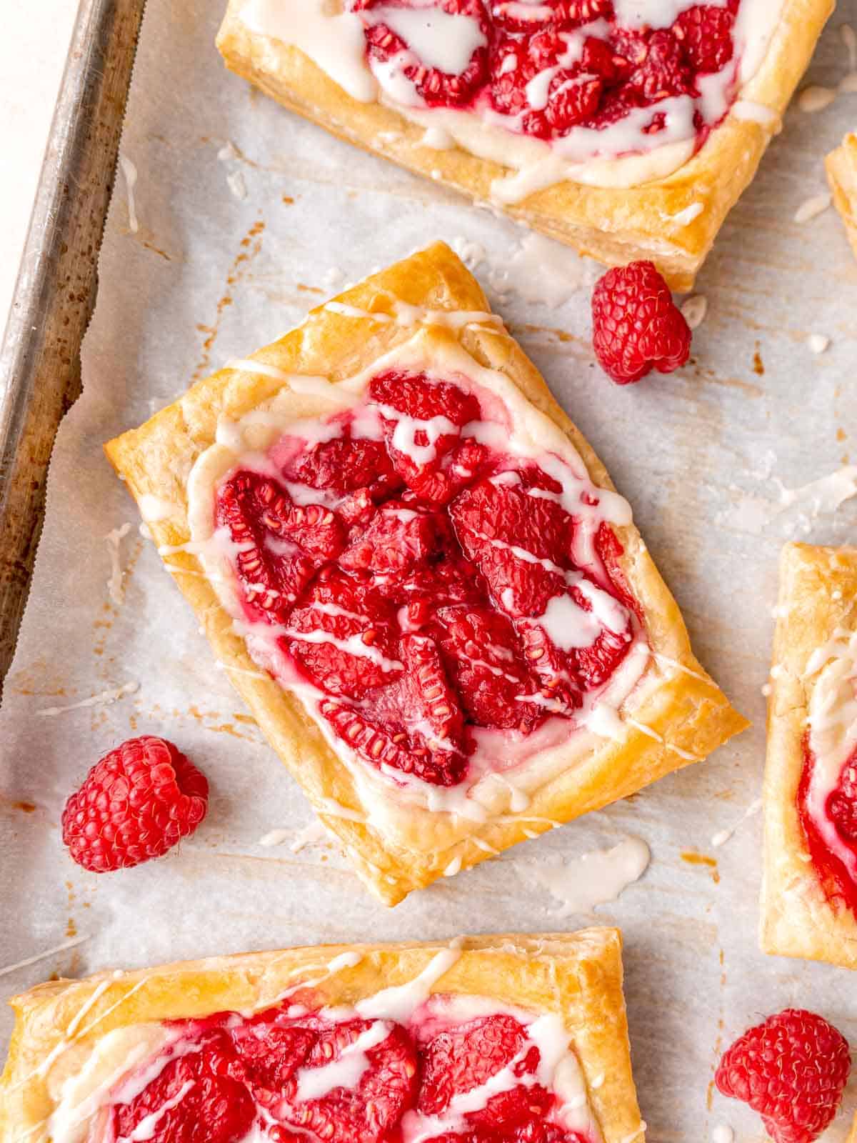 Easy Puff Pastry Cream Cheese and Berry Danishes - Our Best Bites