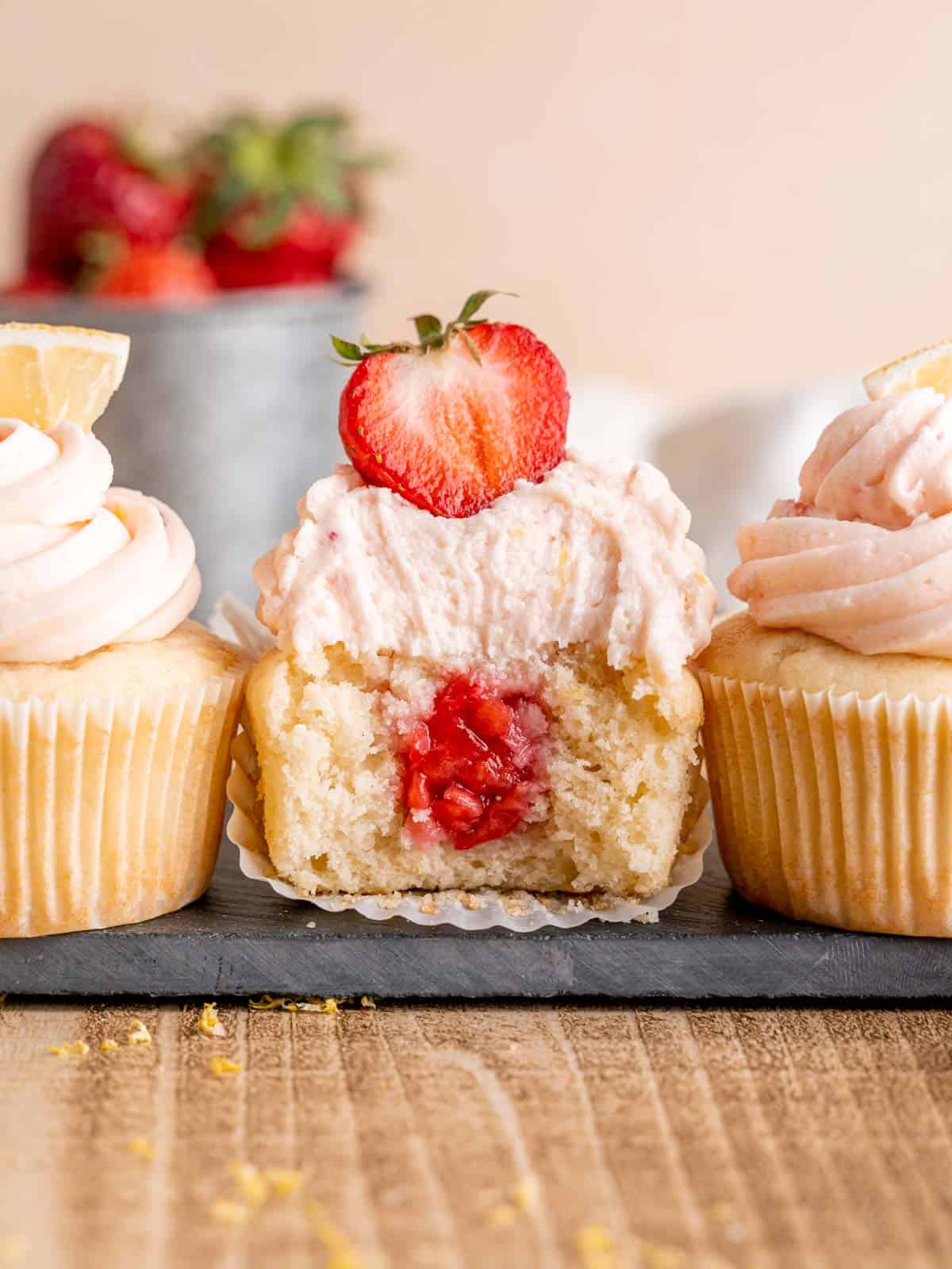 vanilla cupcakes with strawberry frosting