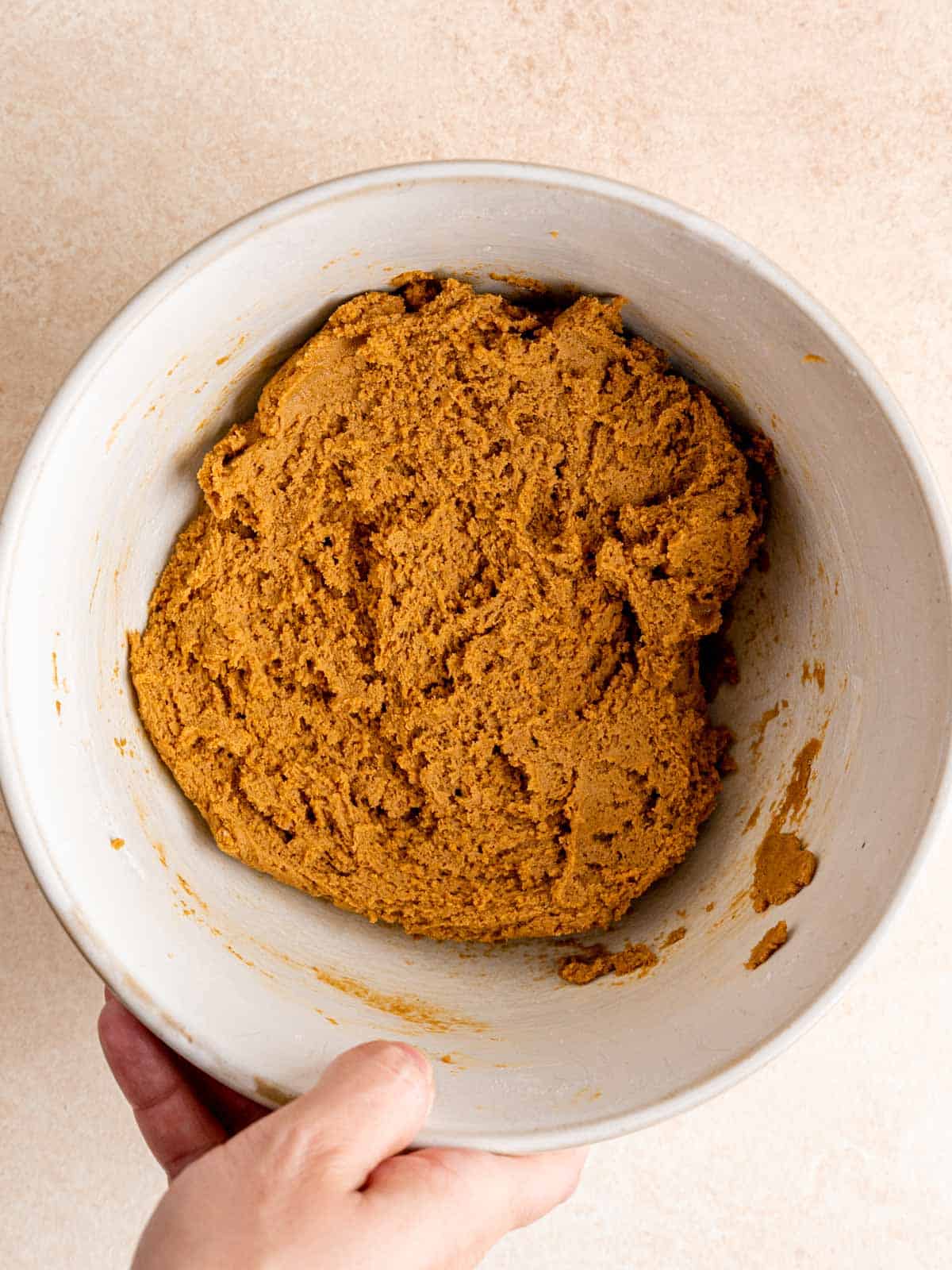 Ginger molasses cookie dough in a bowl.