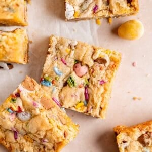 Top view of mini egg blondies cut into squares.