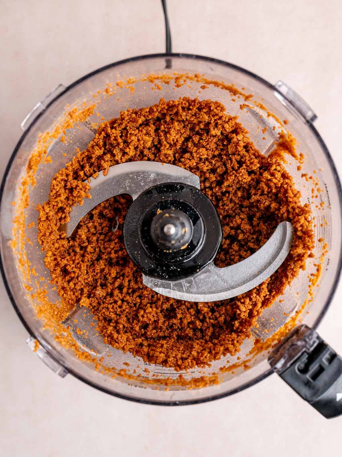 Biscoff cookies and melted butter chopped in a food processor.