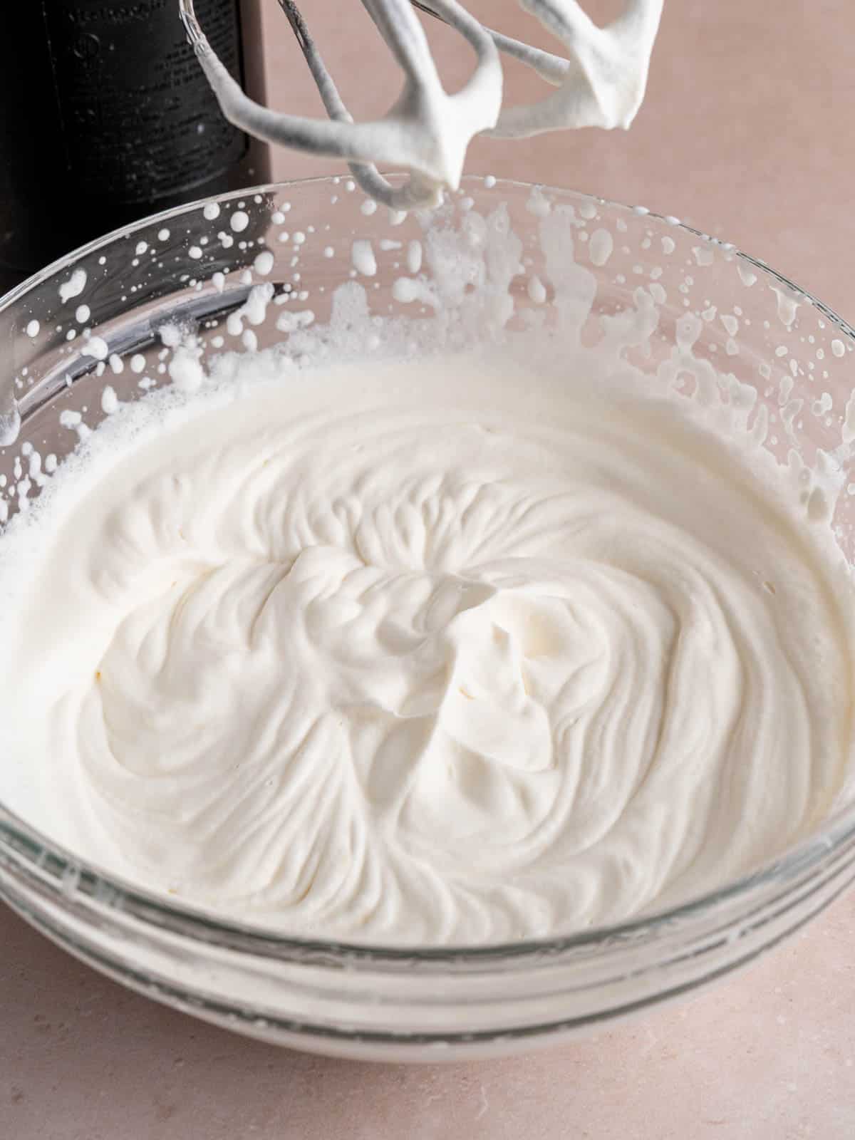 Heavy whipping cream whipped to stiff peaks.
