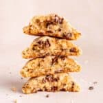 A stack of Levain Bakery copycat caramel coconut chocolate chip cookies.