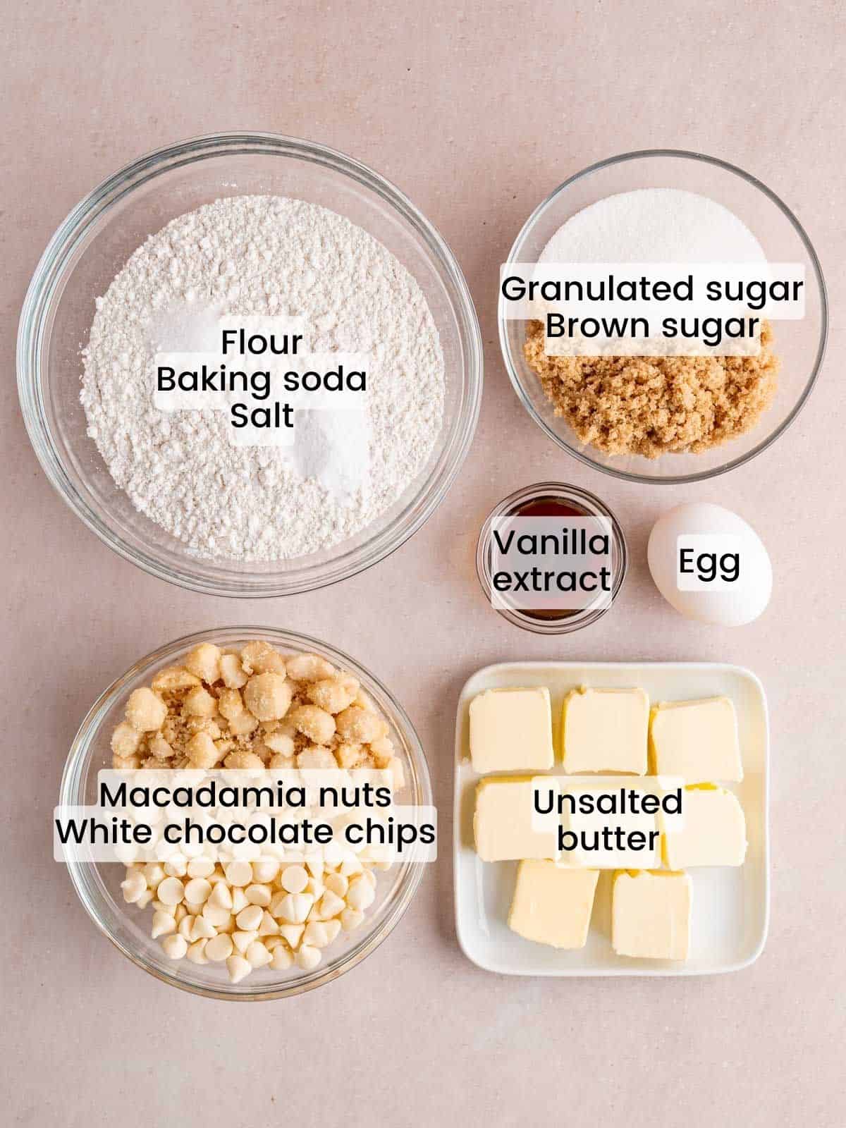 Ingredients needed to make white chocolate macadamia nut cookies.