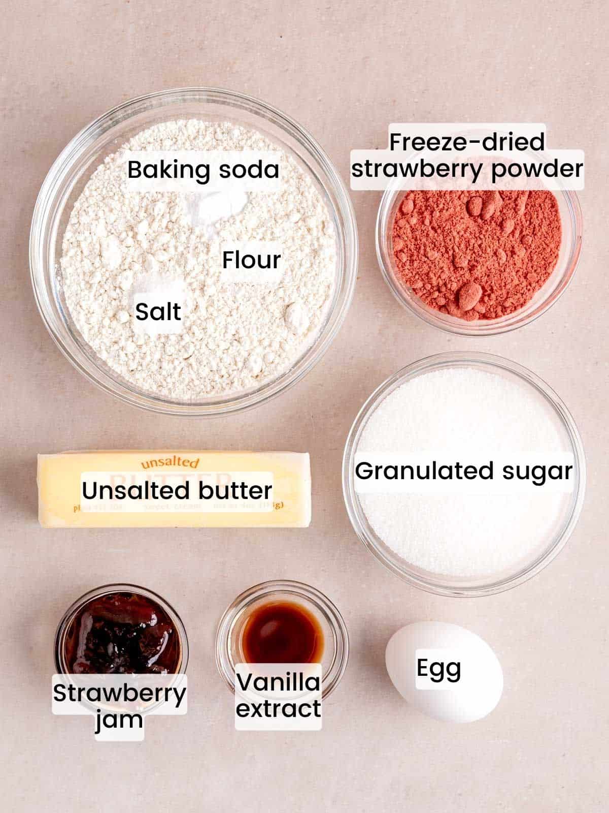 Ingredients needed to make soft strawberry sugar cookies.