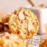 A shortbread cookie with almond filling and sliced almonds on top.