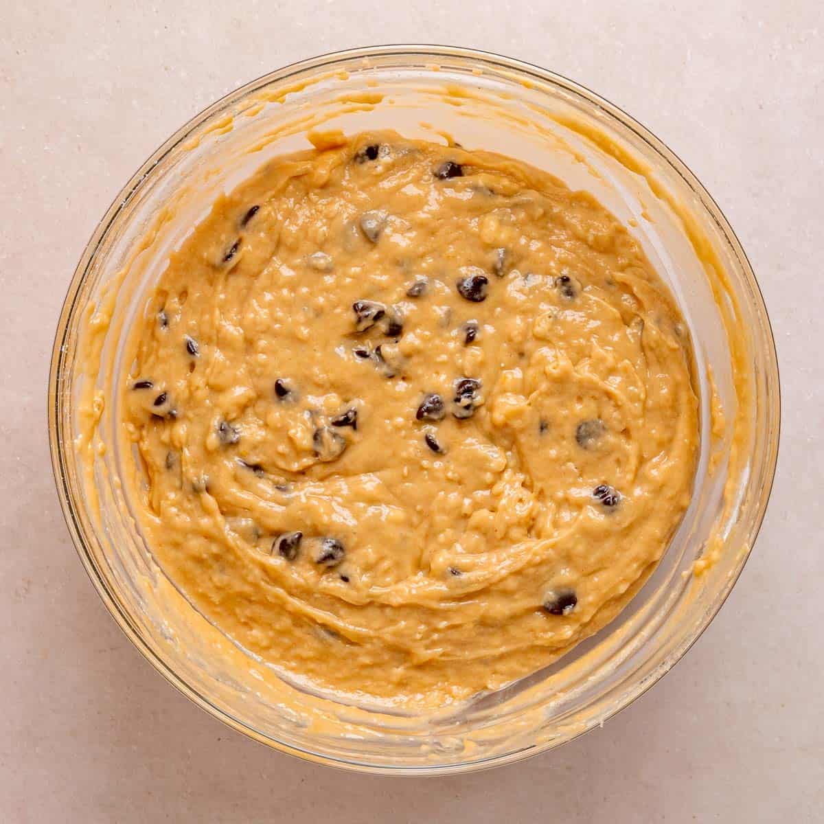 Chocolatey Peanut Butter Muffins 7 Peanut butter chocolate chip muffin batter in a bowl.
