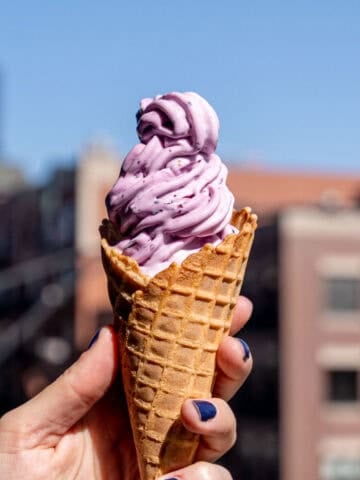 Blueberry lemon cheesecake ice cream swirled in a waffle cone.
