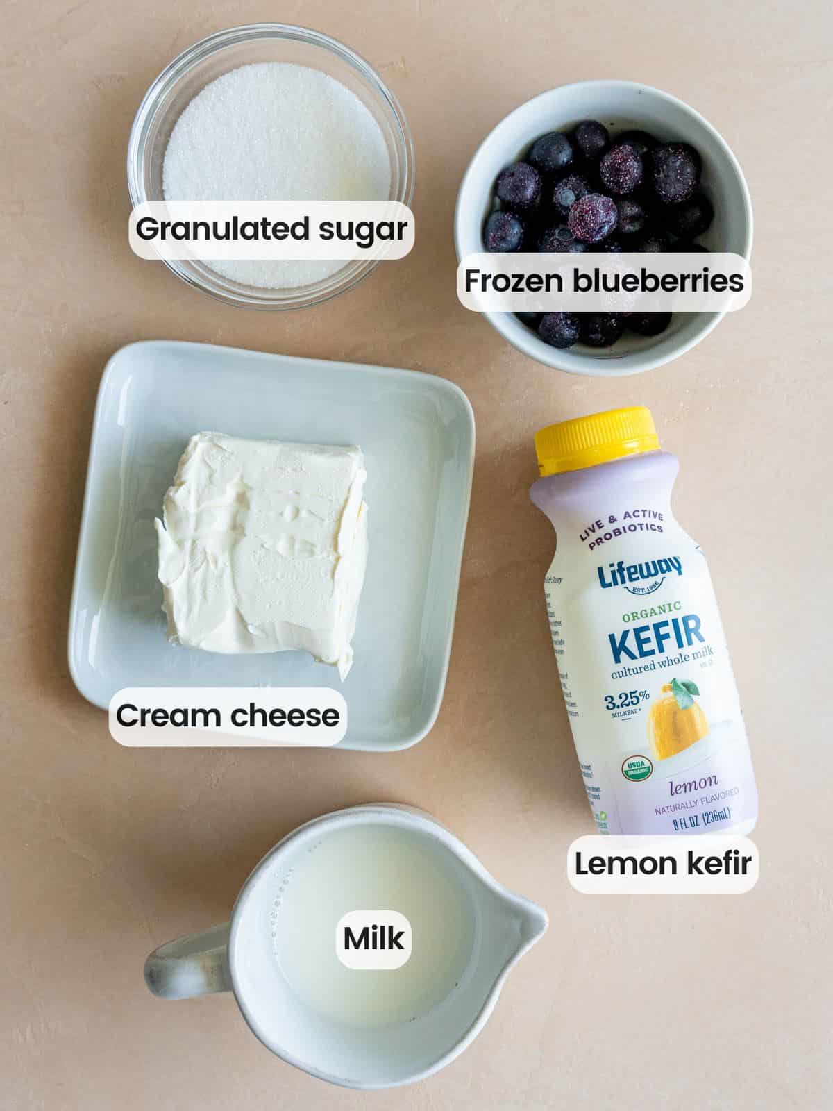 Ingredients needed to make lemon cheesecake ice cream with blueberries in a Ninja Creami.