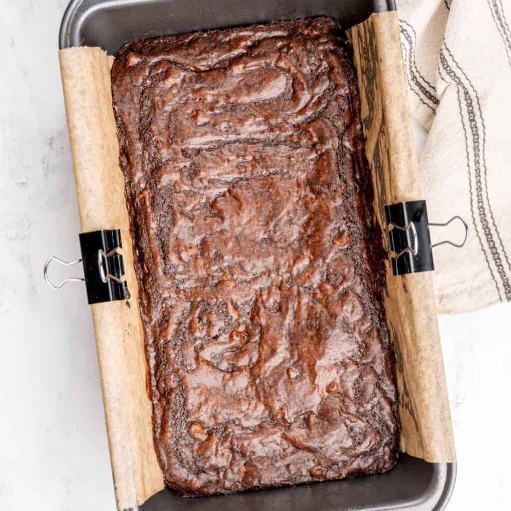 Loaf pan brownies with shiny, crinkly tops.