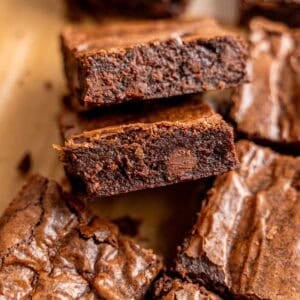 Slices of fudgy small batch brownies with chocolate chips and crinkly tops.