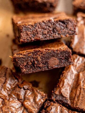 Slices of fudgy small batch brownies with chocolate chips and crinkly tops.