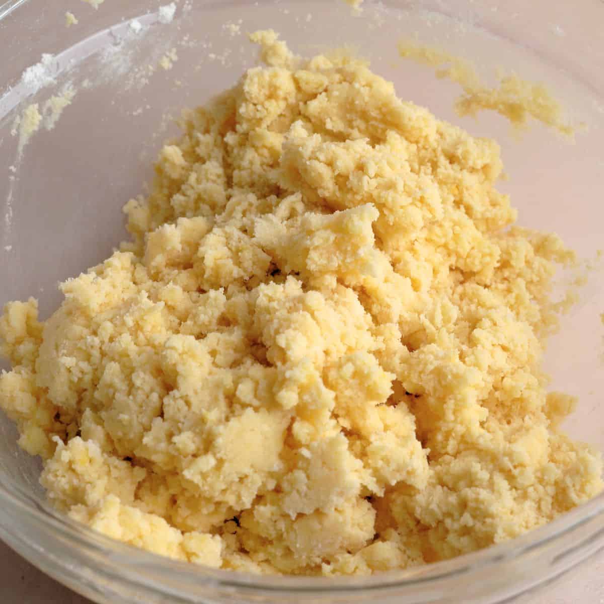 Lemon cookie dough in a bowl.