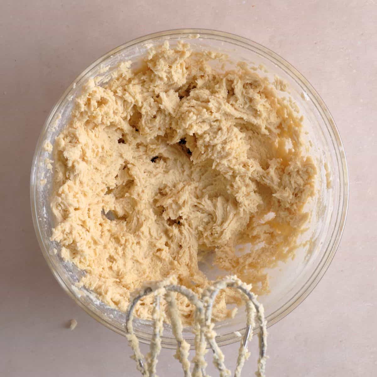 Dry cookie ingredients mixed into the wet ingredients with a hand mixer.