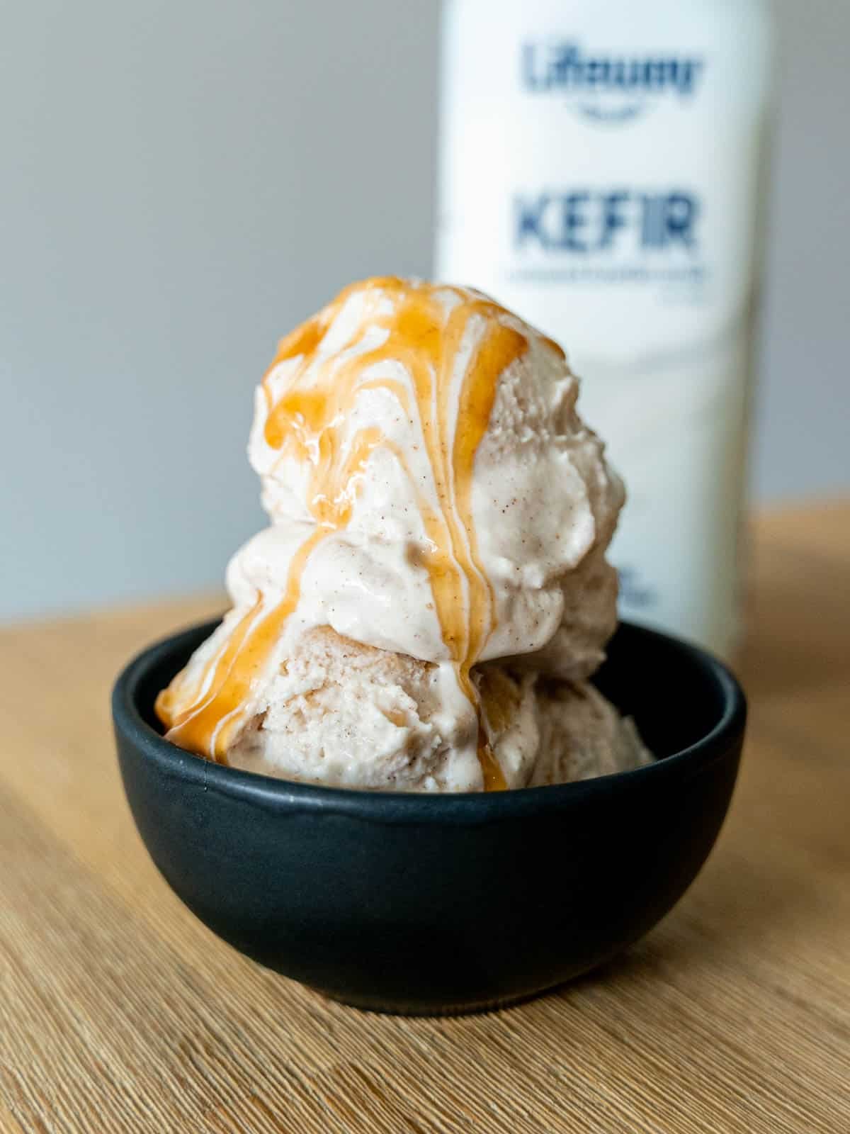 Caramel apple ice cream next to a bottle of Lifeway Kefir.