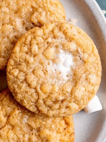 A plate of marshmallow crispy cookies.