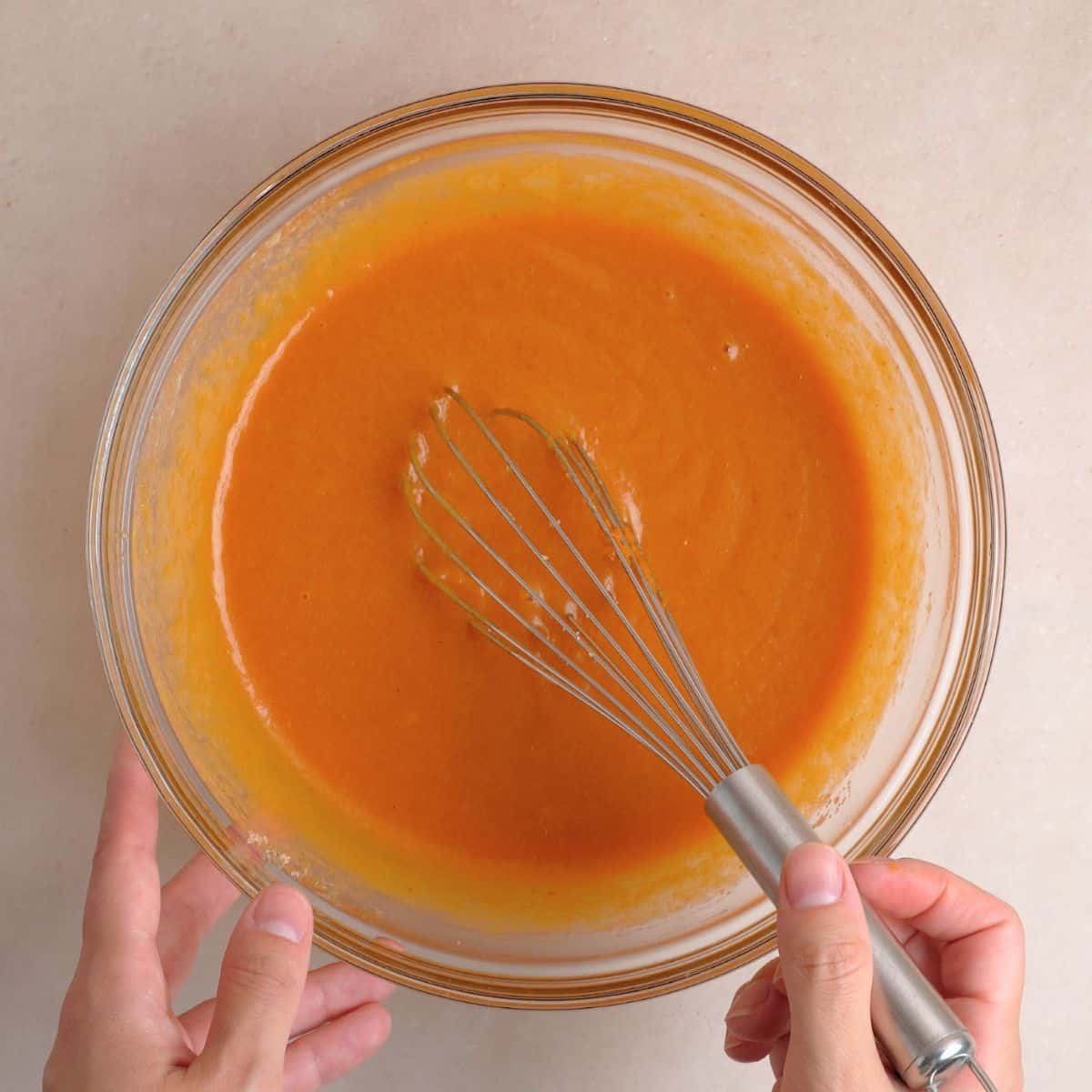 Eggs, vegetable oil, kefir, vanilla extract, pumpkin puree, and both sugars mixed together.