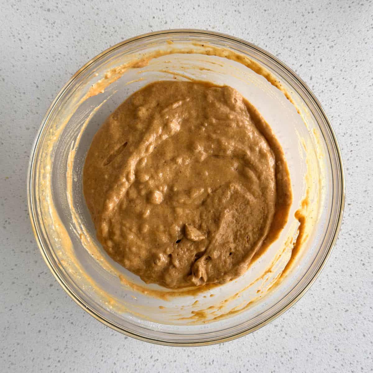 Gingerbread pancake batter in a bowl.